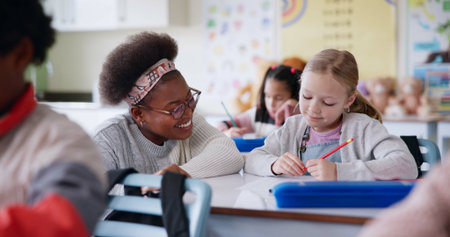 Girl, teacher and talking in classroom with help, advice and smile for assessment for development....
