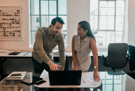 Planning, laptop and business people in office for architecture, project management or...