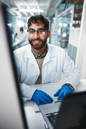 Science, man and typing in laboratory on computer for medical results, investigation and...