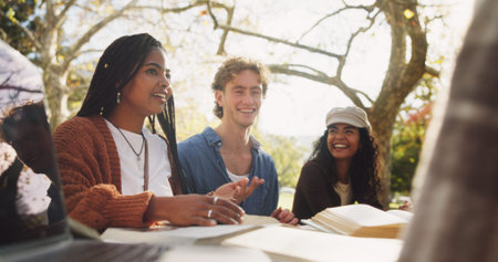 Group, friends and college to study outdoor on school break, discussion and laughing of joke in...