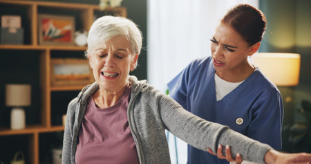 Women, physiotherapist and senior patient with injury on arm stretching for rehabilitation, support...