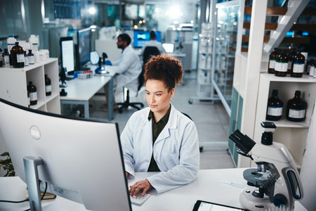Computer, report and science with woman in laboratory for development, innovation or research....