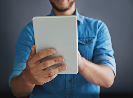 Digital, businessman and hands with tablet in studio for company website update, server maintenance...