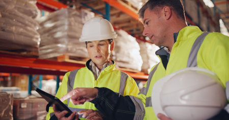 Logistics, team and tablet in warehouse for planning, inventory management and stock selection....