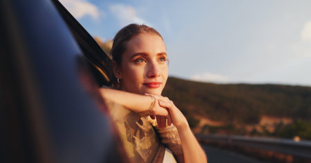 Car, ride and road trip for woman, relax and thinking of freedom in nature, vacation and travel for...