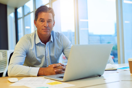 Businessman, portrait and laptop as management, employee and accountant in finance company. Male...