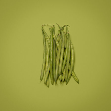 Group, green beans and healthy in studio, vegetable and nutrition of food, wellness and diet with vitamin. Organic, raw and ingredients for dinner of salad, meal and crops for vegan or nutritionistの写真素材
