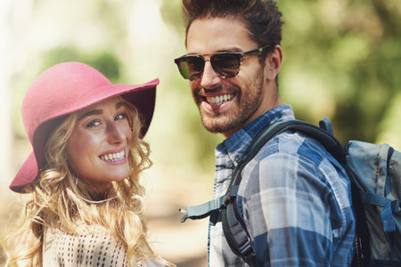 Happy, couple and portrait outdoor for hiking in nature on vacation, together and walking in forest...