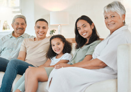 Happy, portrait and child with parents and grandparents on sofa for bonding, connection or care in...