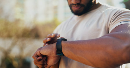 Fitness, smart watch and hands check pulse during training, exercise or workout progress on app....