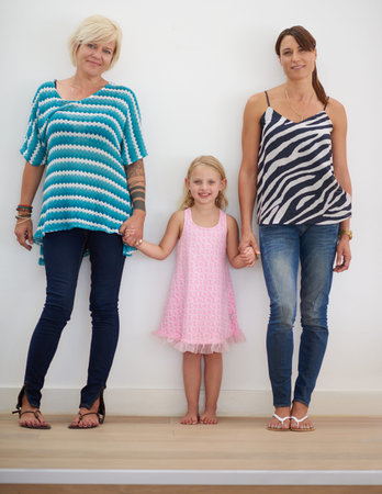 Portrait, lesbian and family with child at house for adoption commitment, holding hands and...