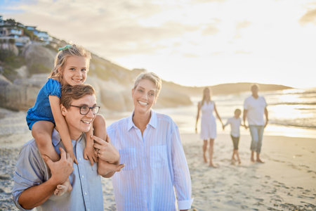 Parents, girl and happy at beach on shoulder for bonding, care and love in Mauritius. Family, people and smile with kids for support at seaside on holiday, journey and travel for memories and funの写真素材