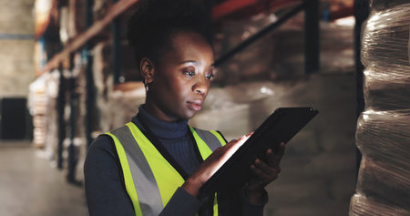 Logistics, black woman and tablet in warehouse for checklist, inspection and stock management....