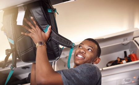 Airplane, travel and black man with bag in cabin for flight, international journey and global...