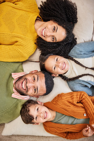 Portrait, family and children in home with winter fashion, support or bonding with smile or foster...
