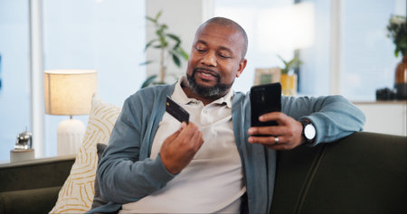 Mature black man, home and phone with credit card for online shopping, discount and sale. Password...