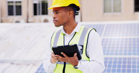 Solar panel, tablet and business man on roof for planning, installation and maintenance....
