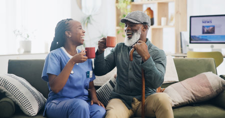Nursing home, senior man and nurse with coffee, laughing and happy to help, healthcare and friends with patient. Living room, tea and wellness of old person, walking stick and caregiver in houseの写真素材