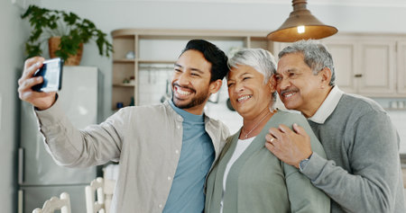 Family, selfie and smile with senior parents and son in home with social media update. Profile picture, people and happy from bonding with love, care and support with internet and online postの写真素材