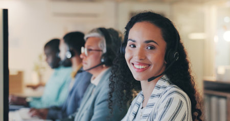 Computer, portrait and businesswoman with microphone for call center, telemarketing and consulting for service. Office, coworking and advisor with headset for listening, answer questions and helpingの写真素材