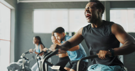 Activity, exercise bike and training with people in gym together for cardio or intense workout....