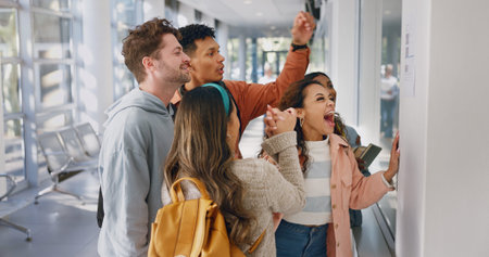 Students, university and excited for exam results on wall, pass and group for assignment...