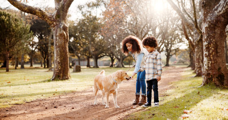 Park, pet and mom and child with dog in nature for training, care and outdoors for relax, chill and...