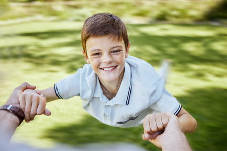 Father, child or portrait in nature for spin, support and trust in relationship. Kid, fun or dad POV...