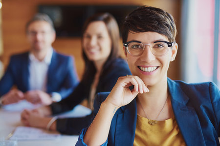 Boardroom, businesswoman and portrait with smile for corporate project, workshop and training for staff. Office, colleague and female hr manager with confidence for company updates, review or meetingの写真素材
