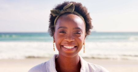 Happy, relax and portrait of black woman at beach for summer vacation, holiday and weekend in...