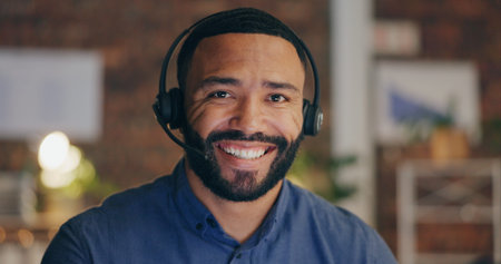 Black man, portrait and headset in office for call center, contact us and customer service with...