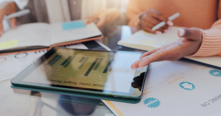 Business, people and hands with graph on tablet screen for annual sales target results and kpi...