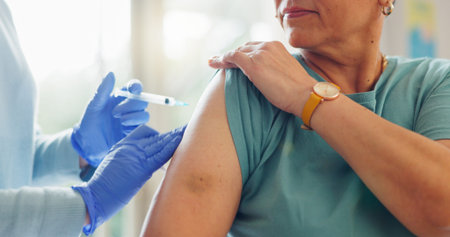 Needle, glove and hand of doctor with patient for injection, cure or vaccination in clinic. Medical,...