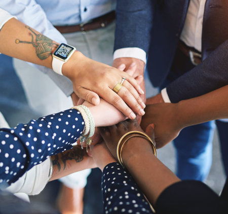 Hands together, business and above in meeting, team building and collaboration for workshop or...