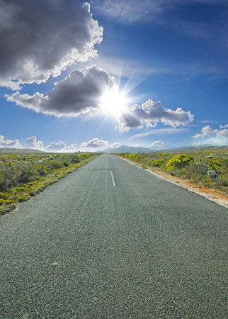 Cloudy sky, countryside and road with nature for trip, drive and travel on holiday in Arizona....