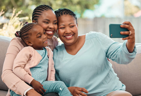 Black family, lesbian couple and selfie in home, love and hug child for photography in living room....