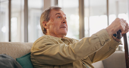 Walking stick, thinking and senior man with dementia in nursing home with sickness. Alzheimers, cane...