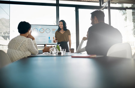 Office, businesswoman and screen for presentation with review, opinion and feedback in workshop. Glass boardroom, teamwork and speaker with answer for corporate meeting, discussion and training infoの写真素材