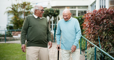 Senior men, laughing and bonding in retirement home as pensioner for activity, walk and relax....