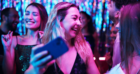 Women, selfie and friends in night club for party, celebration and birthday on weekend with memory....