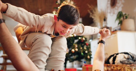 Father, boy and airplane in home for playing, Christmas and bonding with holiday and celebration....