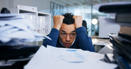 Business man, stress and paperwork in office for project deadline, brain fog and frustrated with...