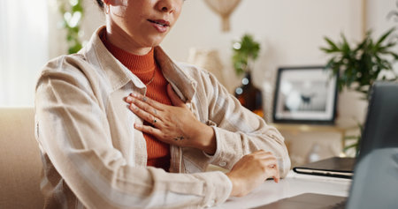 Chest pain, heartburn and business woman in office for stress, overworked and heart attack....
