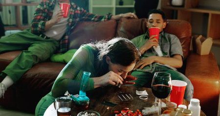 People, house party and woman with cocaine, night and illegal substance with alcohol. Group, event...