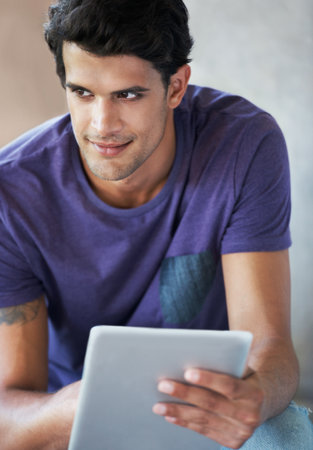 Man, thinking and portrait with tablet on stairs for social media, digital app and online. Male person, style and smile on website for fashion tips, communication and networking and connectionの写真素材