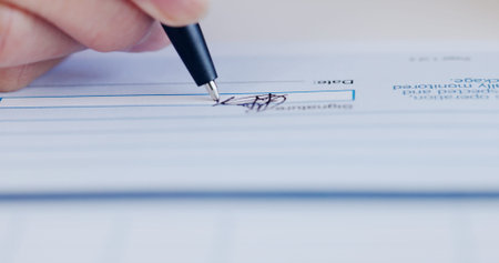 Hands, signature and person with document in office for onboarding process for new job. Paperwork,...
