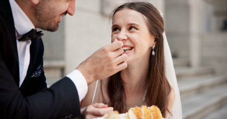 City, smile and couple at wedding with cake, love and happy bride with groom in street together....
