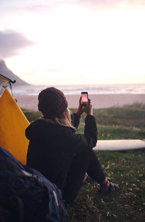 Beach, camping and girl with picture, photo and capture moment with vacation. Woman, seaside and...