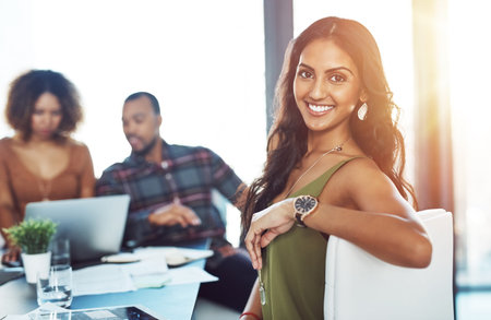 Confidence, portrait and happy woman in creative meeting with smile, business plan and diversity in...
