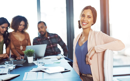 Confidence, portrait and happy woman in strategy meeting with creative business plan for office...